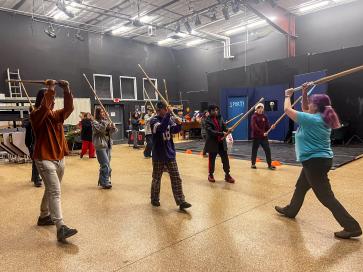 People holding sticks